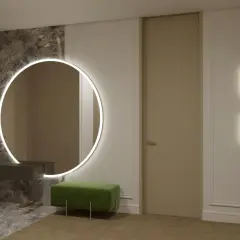 Eleganckie, duże lustro do przedpokoju z podświetleniem LED, wiszące nad ciemną konsolą. Obok zielona pufa i drzwi.