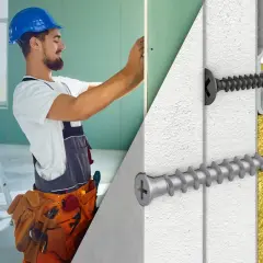 Majster w kasku montuje płytę GK, zbliżenie na wkręty do płyt gipsowo-kartonowych.