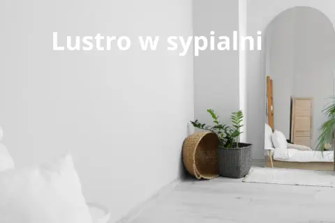 Eleganckie lustro w sypialni feng shui odbija spokojną przestrzeń, dodając jej harmonii i światła.
